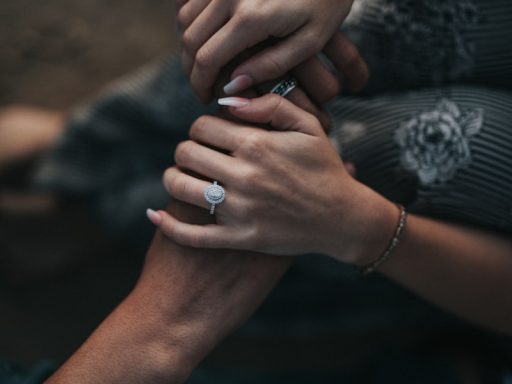 man and woman holding each others hands